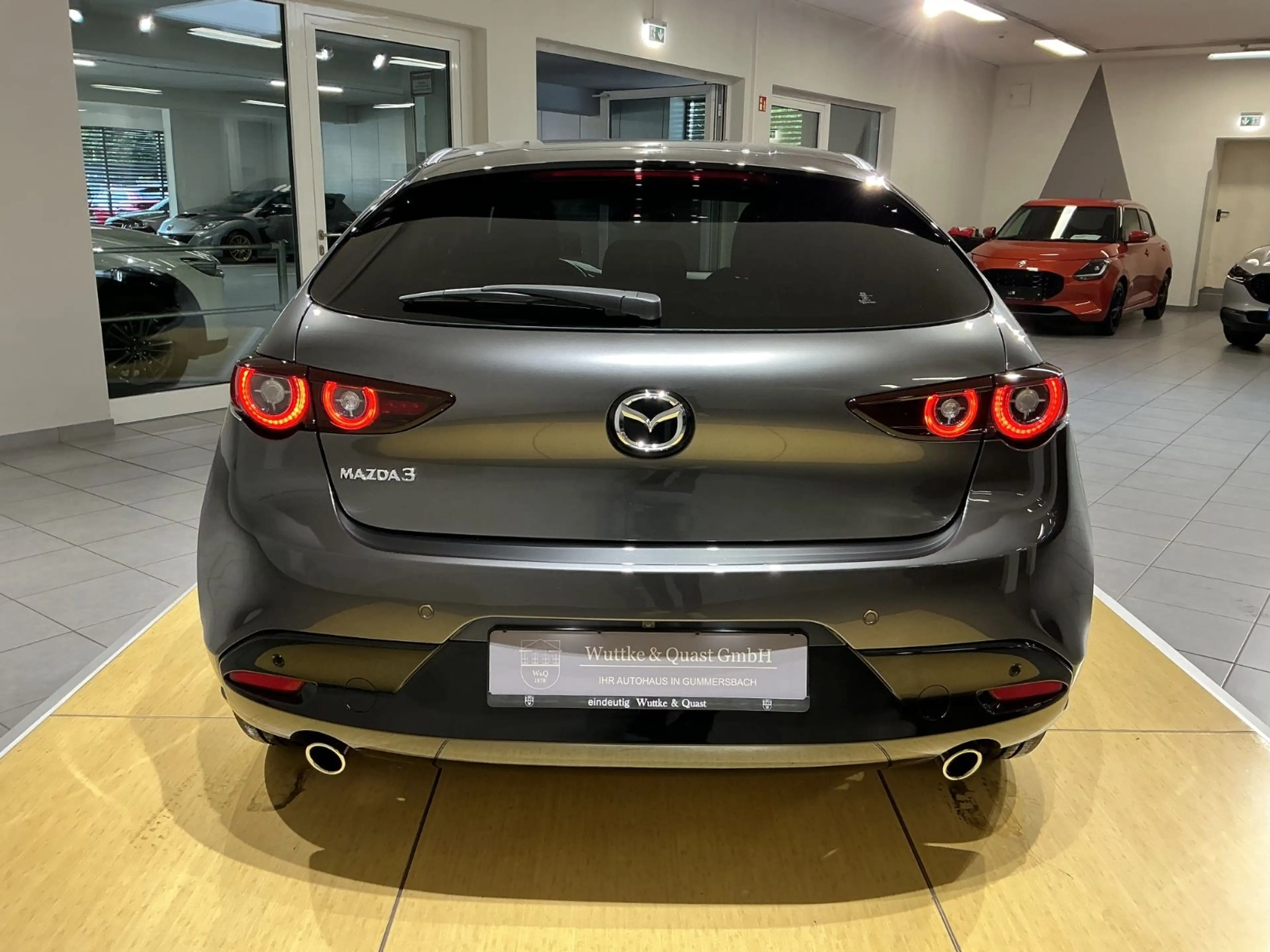 Mazda 3 Exclusive-Line *BOSE*360°*Matrix*Carplay* — photo 4