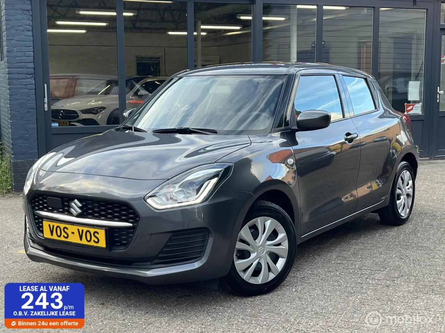 Suzuki Swift 1.2 Comfort Smart Hybrid | Rijklaar Grijs - 1