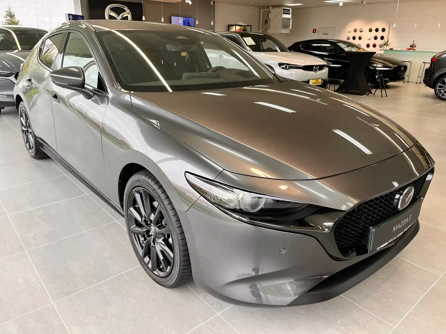 Mazda 3 3 e-SKYACTIV-X 186 M HYBRID Aut. EXCLUSIVE-LINE Gris - 1