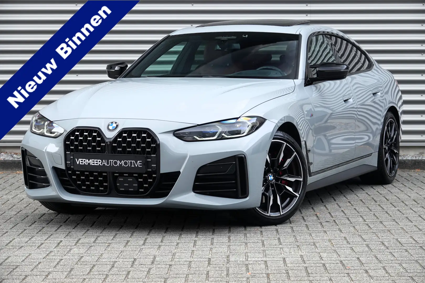 BMW 440 4-serie Gran Coupé M440i xDrive High Executive M S Grijs - 1