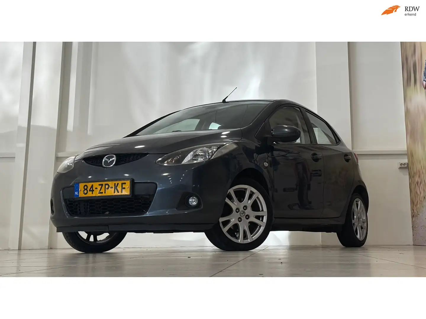 Mazda 2 1.3hp S-VT Executive 2e Eigenaar Stoelverwarming! Grau - 1