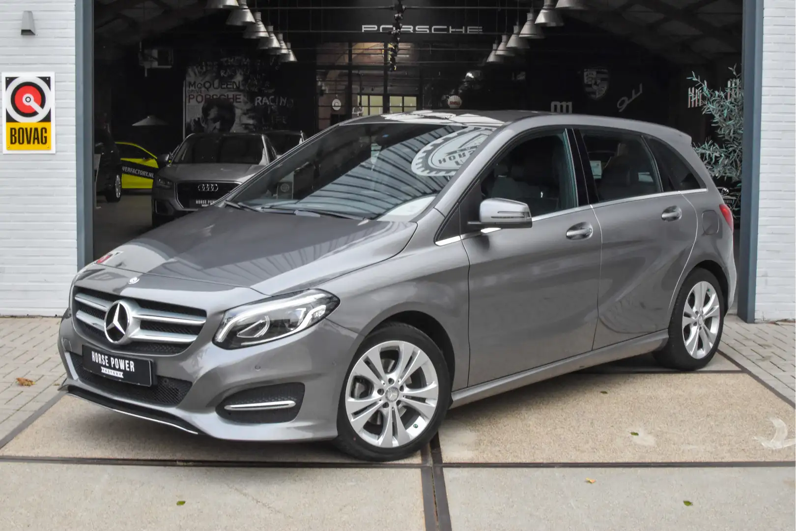 Mercedes-Benz B 180 Ambition *Trekhaak | Halfleder | A/C | Navi | Crui Grijs - 1