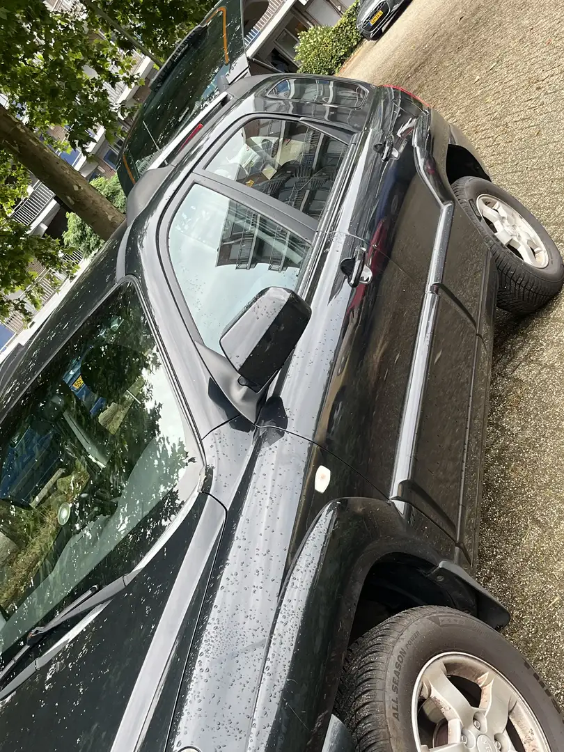 Kia Sportage 2.0 CVVT X-ecutive Noir - 1