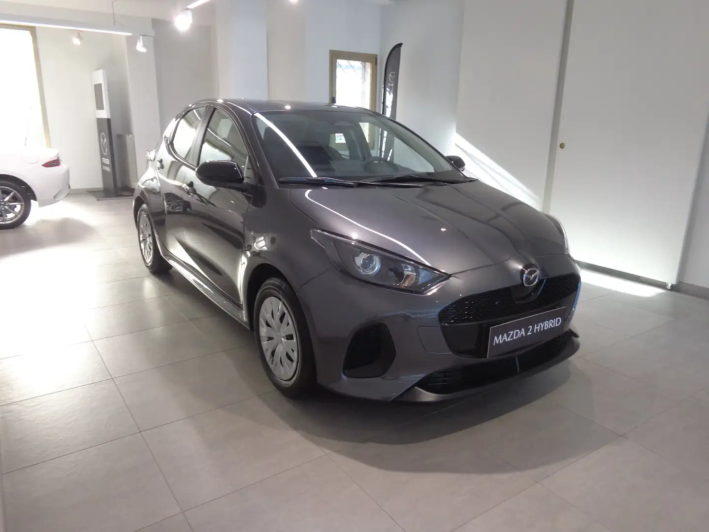 Mazda 2 2 IV 2024 1.5 vvt full hybrid Prime Line e-cvt Grigio - 1