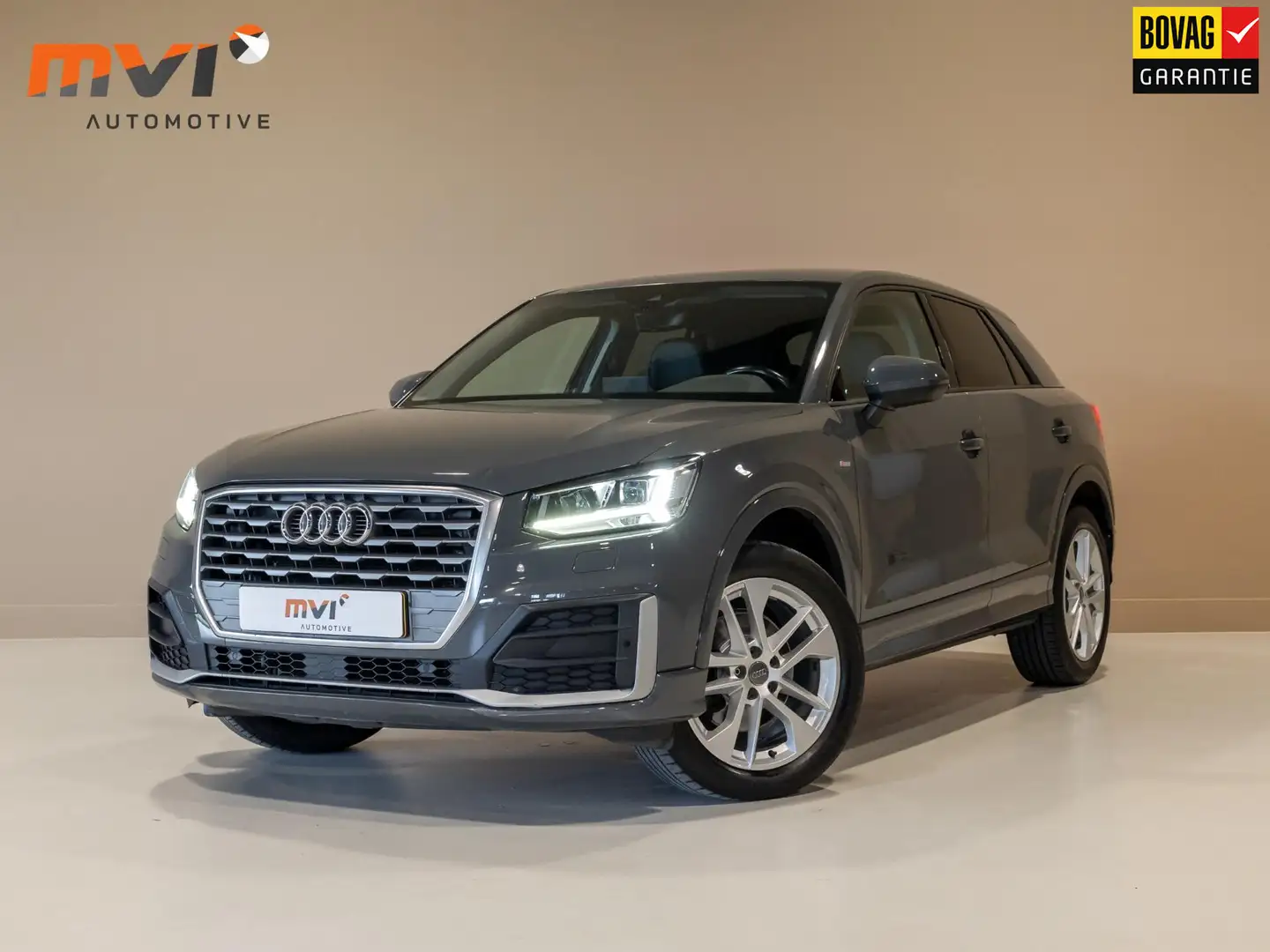Audi Q2 1.4 TFSI CoD S-Line / 150pk / Stoelverwarming / Le Grijs - 1