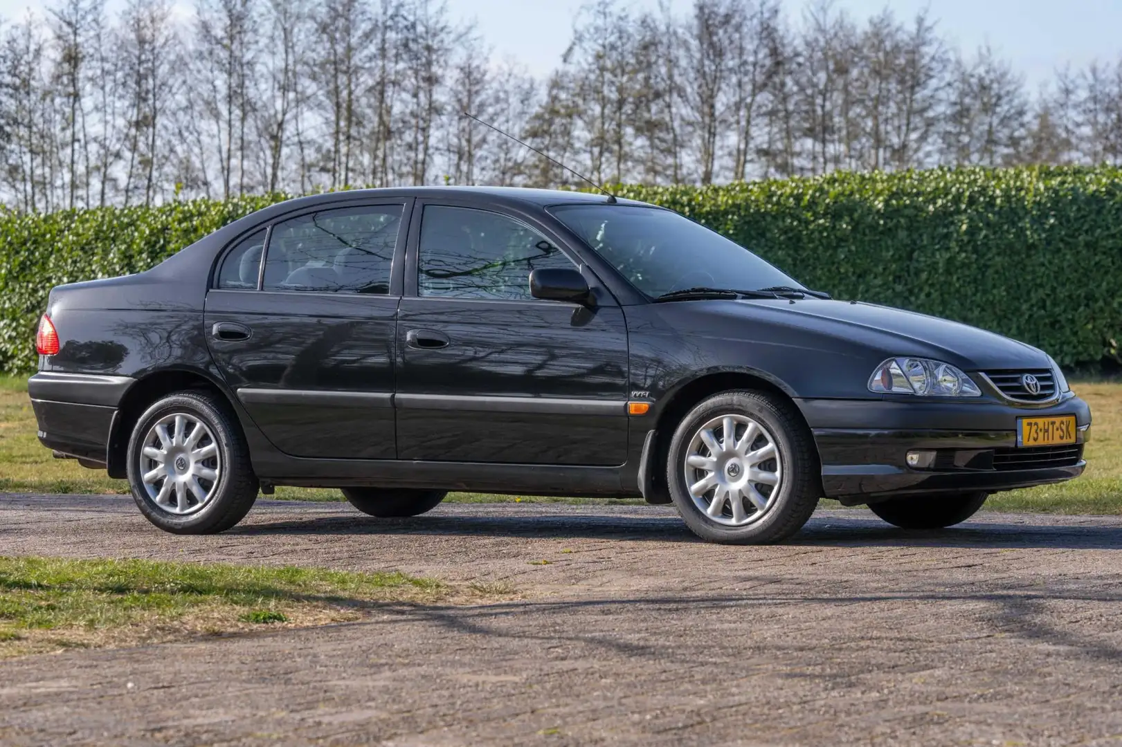 Toyota Avensis 1.8-16V Linea Sol 48.600 km +NAP NL-auto Zwart - 2