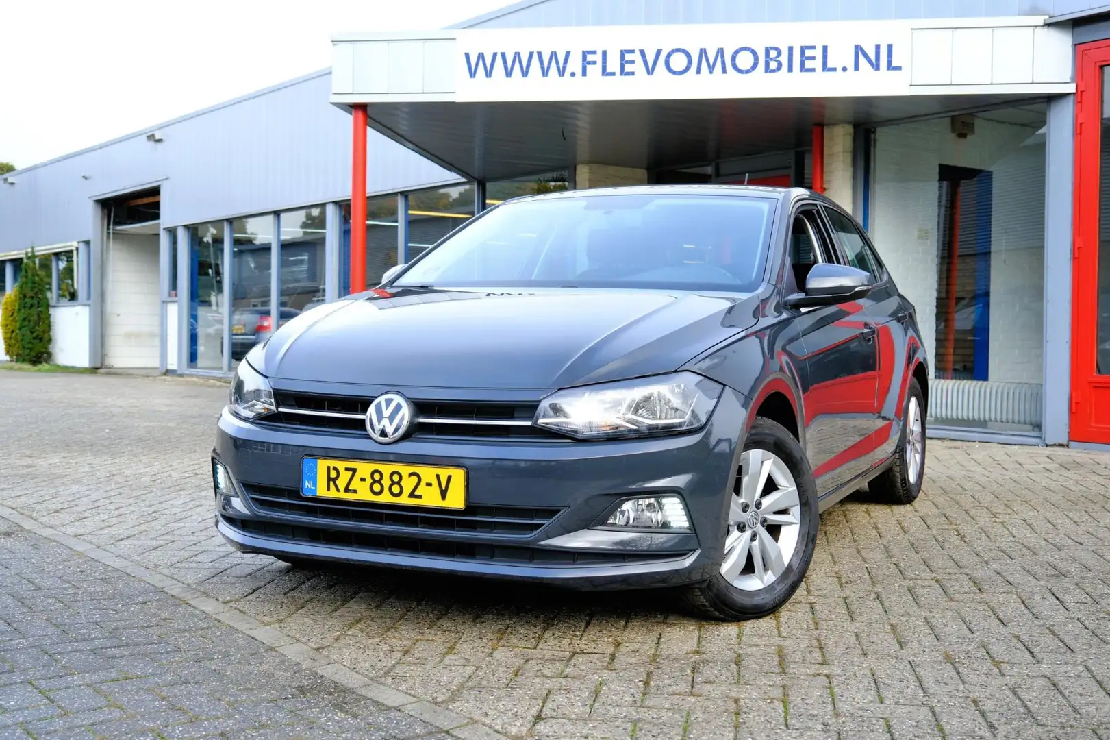 Volkswagen Polo 1.0 TSI Comfortline *59.400km!* Airco|Adapt-Cruise Gris - 1