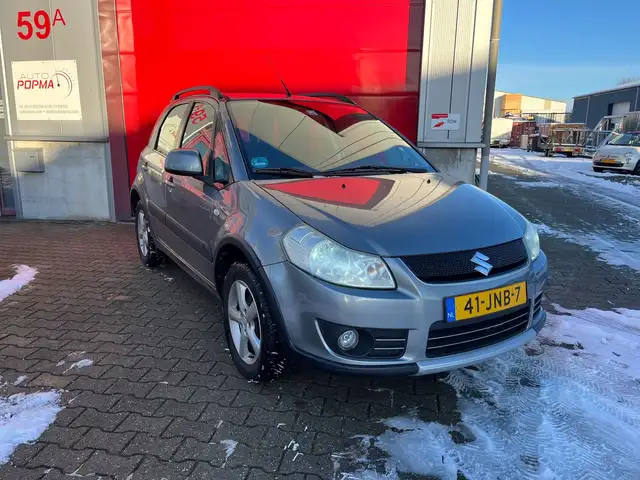 Suzuki SX4 1.6 107 pk 4Grip Exclusive / 4 x 4 / Trekhaak / Au