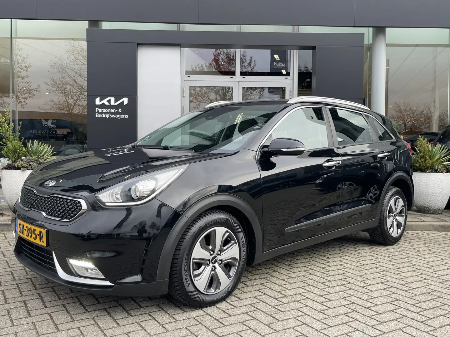 Kia Niro 1.6 GDi Hybrid DynamicLine Allweatherbanden | Trek Negro - 1