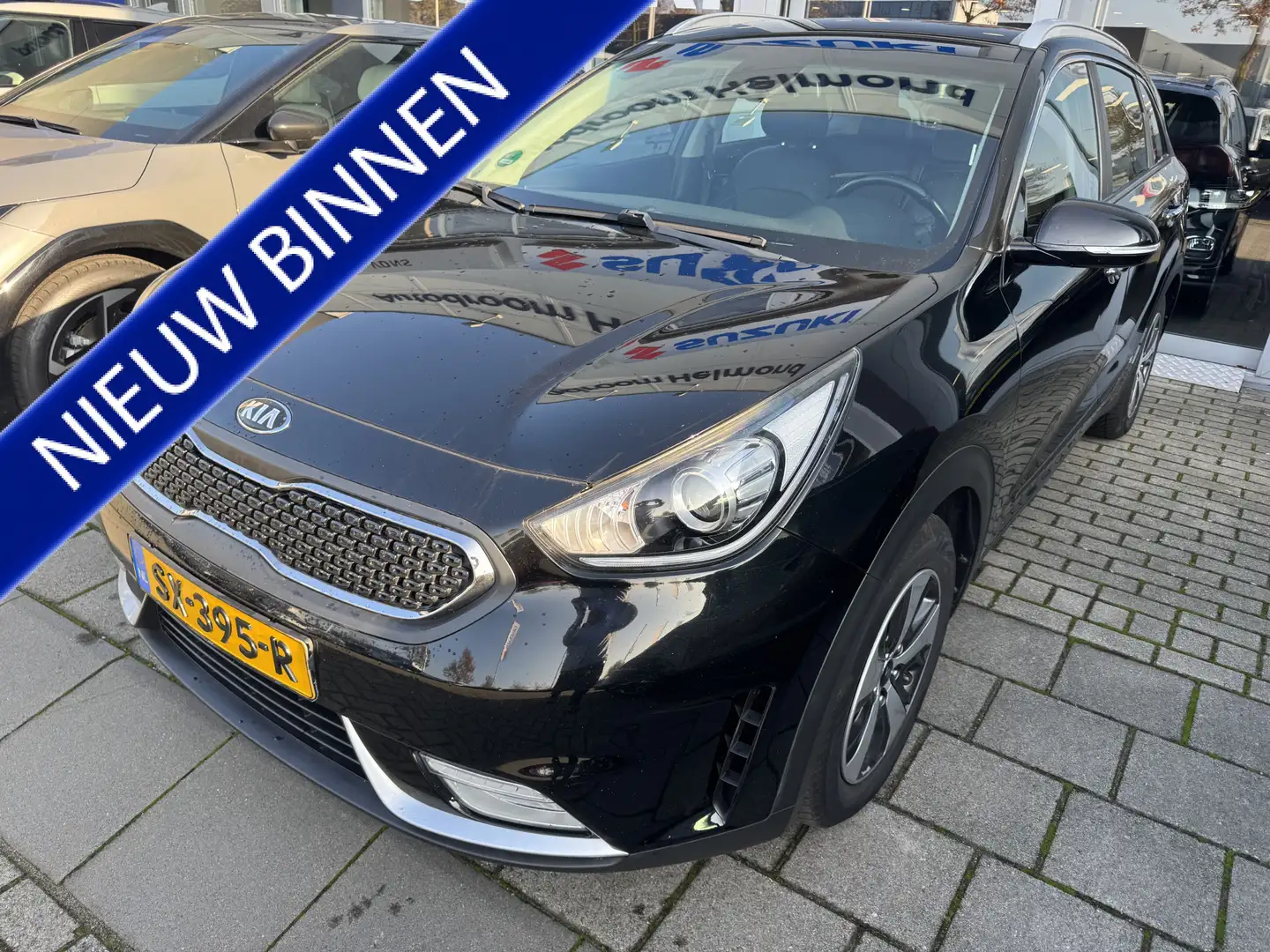 Kia Niro 1.6 GDi Hybrid DynamicLine Allweatherbanden | Trek Schwarz - 1