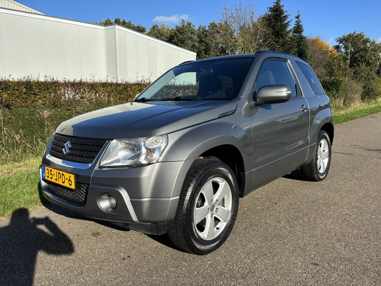 Suzuki Grand Vitara 2.4 Exclusive / AIRCO ECC / 4x4 / 4WD / TREKHAAK Grijs - 1