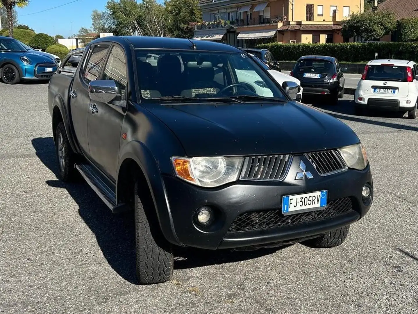 Mitsubishi L200 L200 Cab IV 2006 d.cab 2.5 di-d Invite Zwart - 2