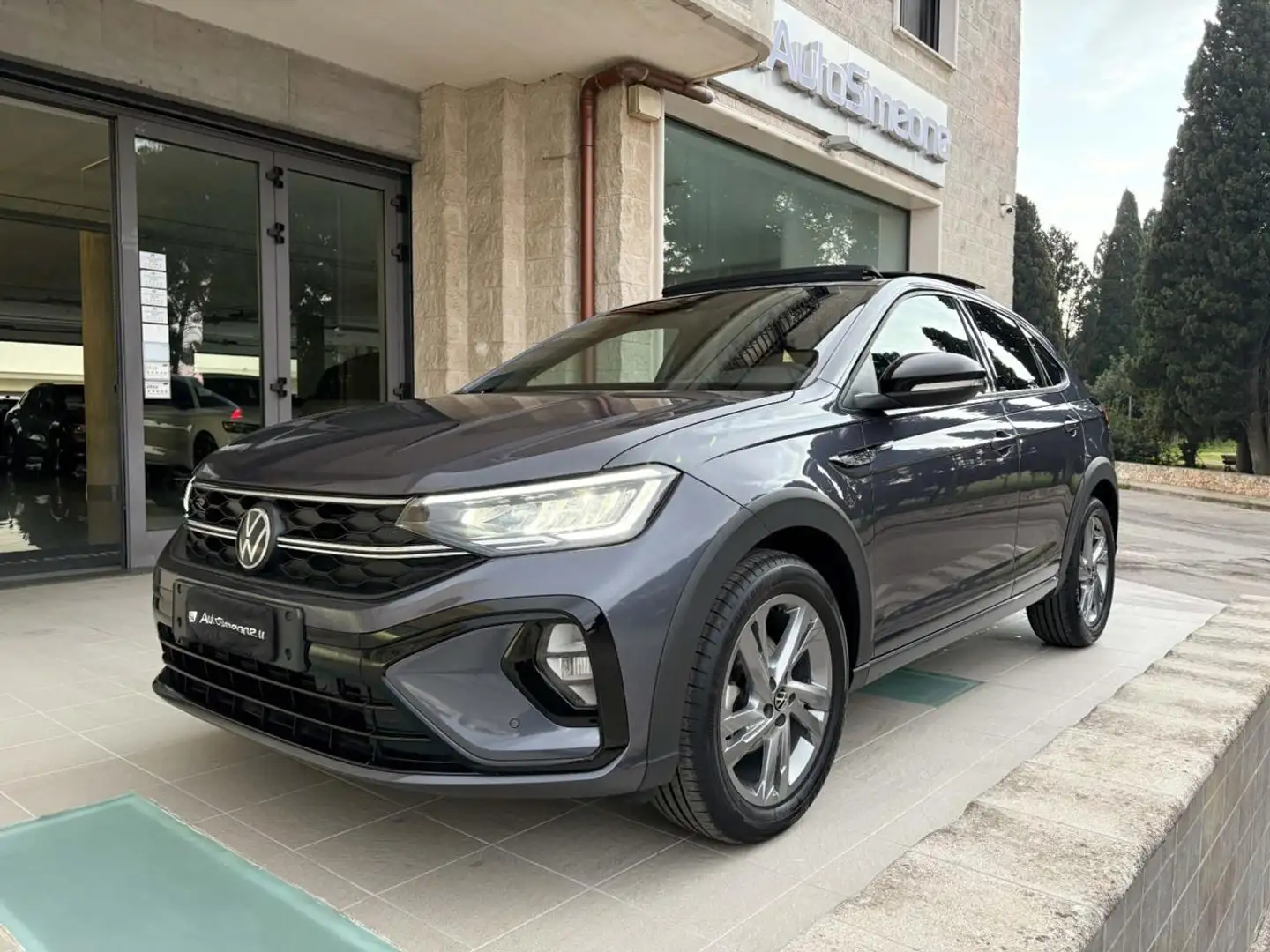 Volkswagen Taigo 1.0 TSI 110 CV DSG R-Line TETTO APR/PAN Grigio - 1