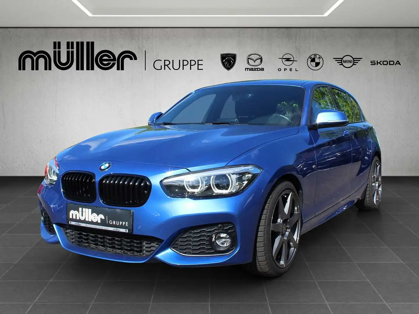 BMW 118 i Aut. Edition M Sport Shadow Blauw - 1