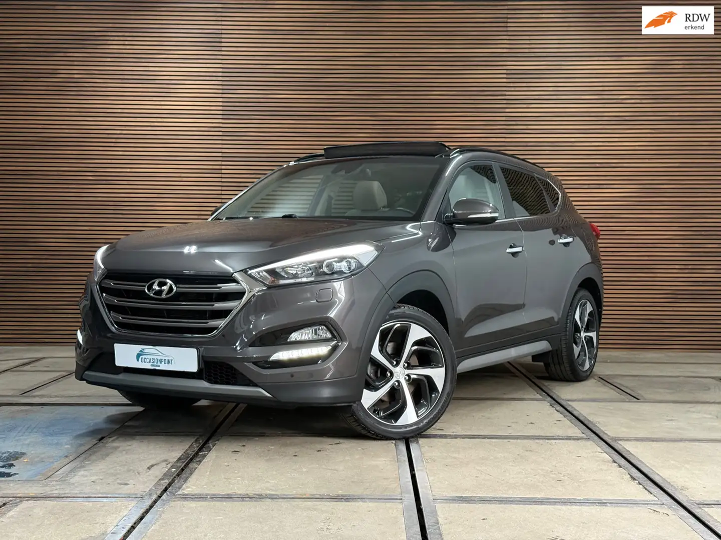 Hyundai TUCSON 1.6 T-GDi Premium | Pano | Camera | Winterpakket | Grau - 1