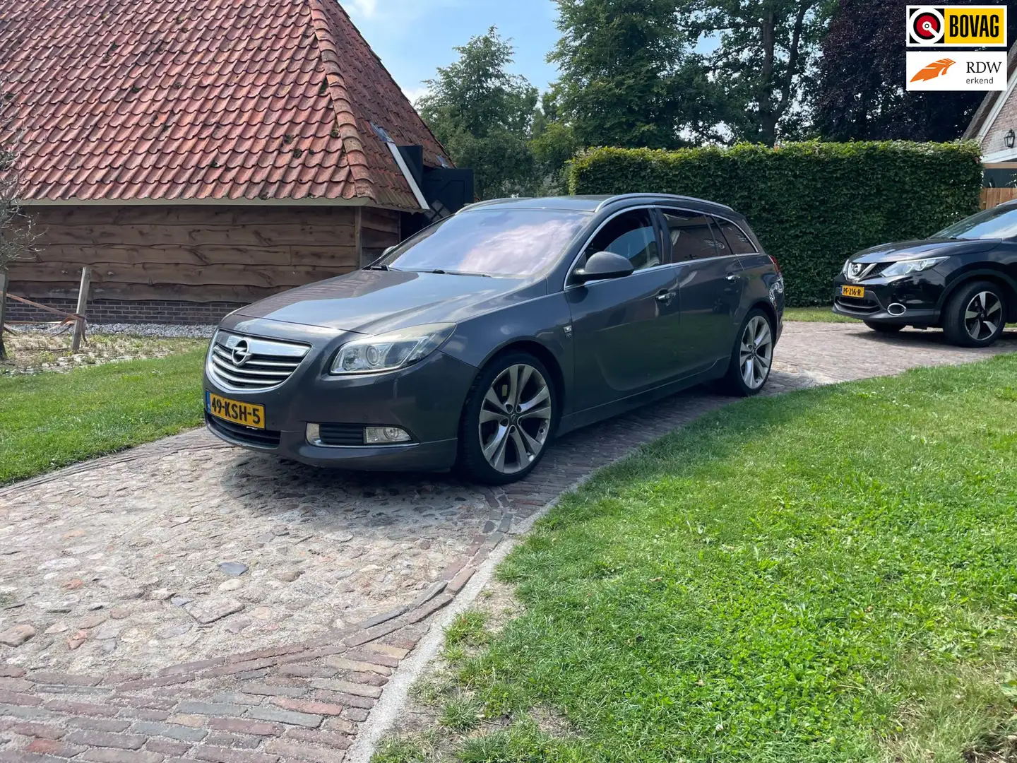 Opel Insignia Sports Tourer 1.6 T Cosmo-200PK-NAVI-PDC-20"-ELEC Grijs - 1