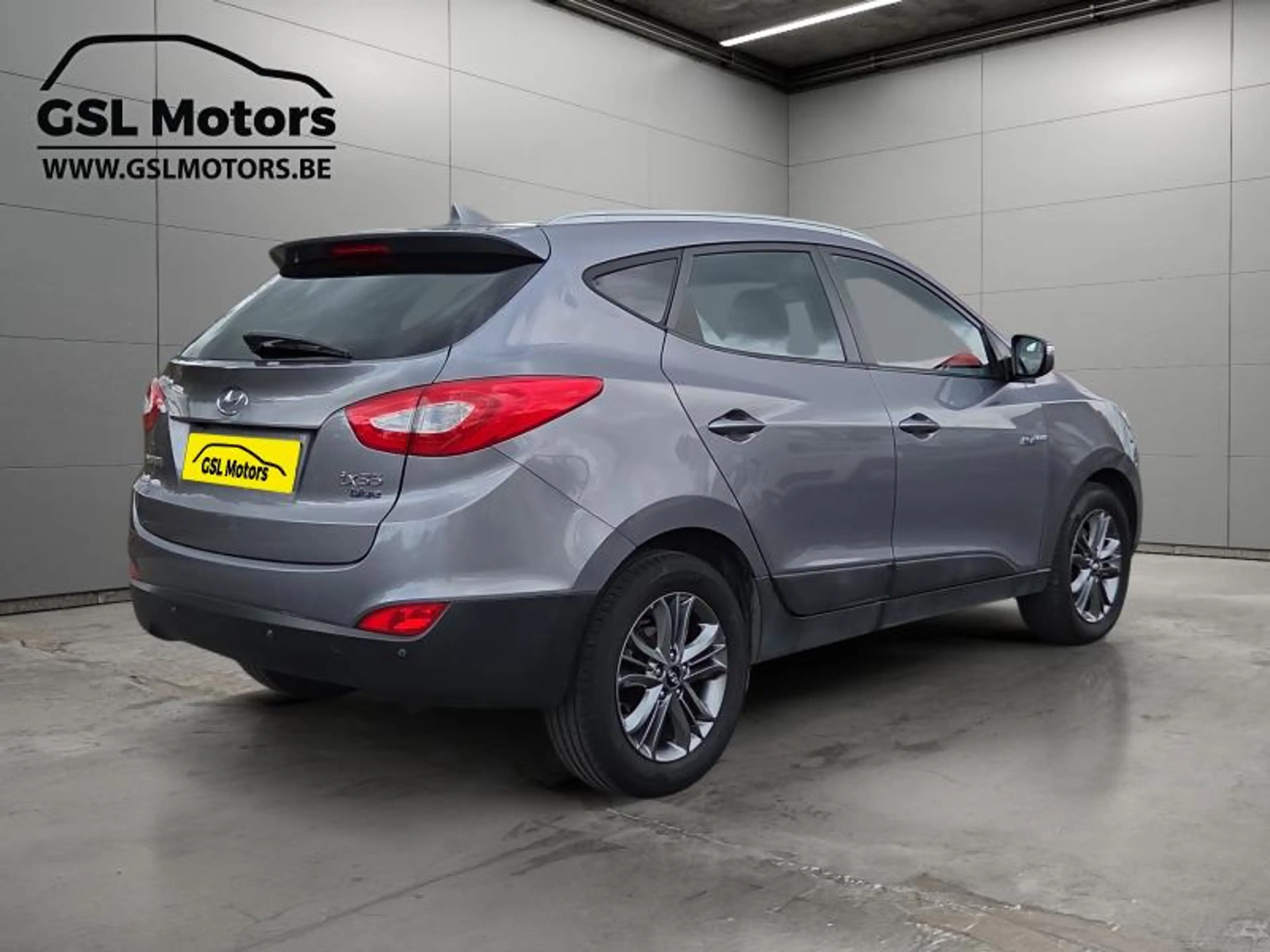 Hyundai iX35 1.7 116cv Gris 01/16 Airco GPS Bluetooth — photo 4