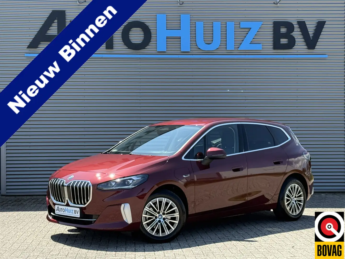 BMW 225 2-serie Active Tourer 225e xDrive High Executive H Rood - 1