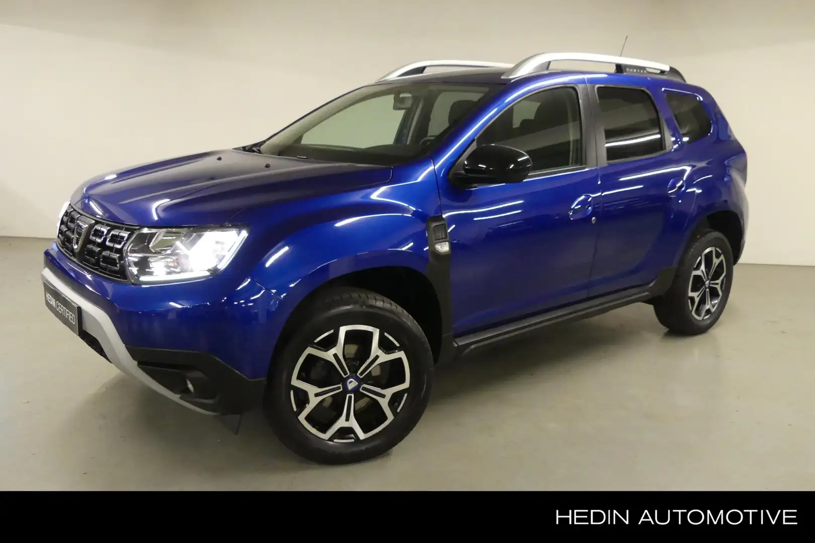 Dacia Duster TCe 100 Bi-Fuel Serie Limitee 15th Anniversary | M Blauw - 1