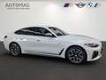 BMW M4 40i xDrive DrivAssProf*ParkAssPlus*AHK*HeadUp*Harm Weiß - thumbnail 2