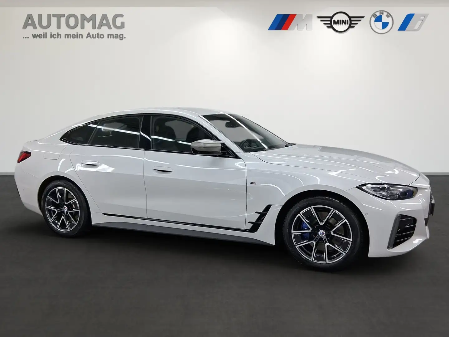 BMW M4 40i xDrive DrivAssProf*ParkAssPlus*AHK*HeadUp*Harm Weiß - 2
