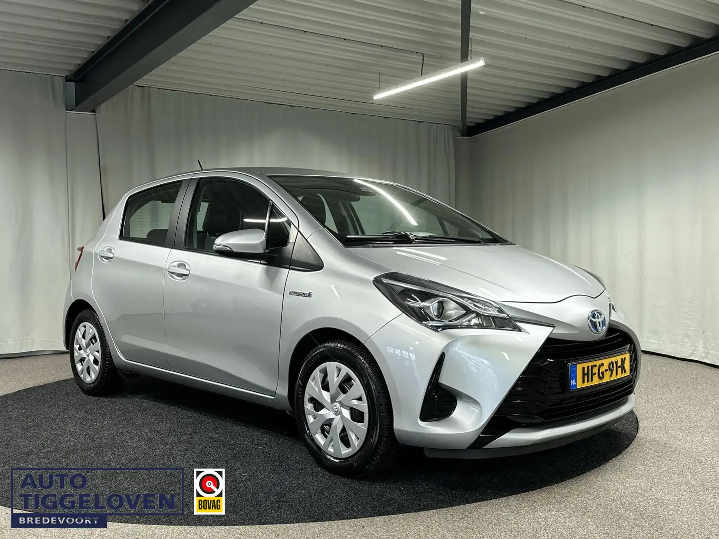 Toyota Yaris 1.5 Hybrid Active Automaat | Navi Grigio - 1
