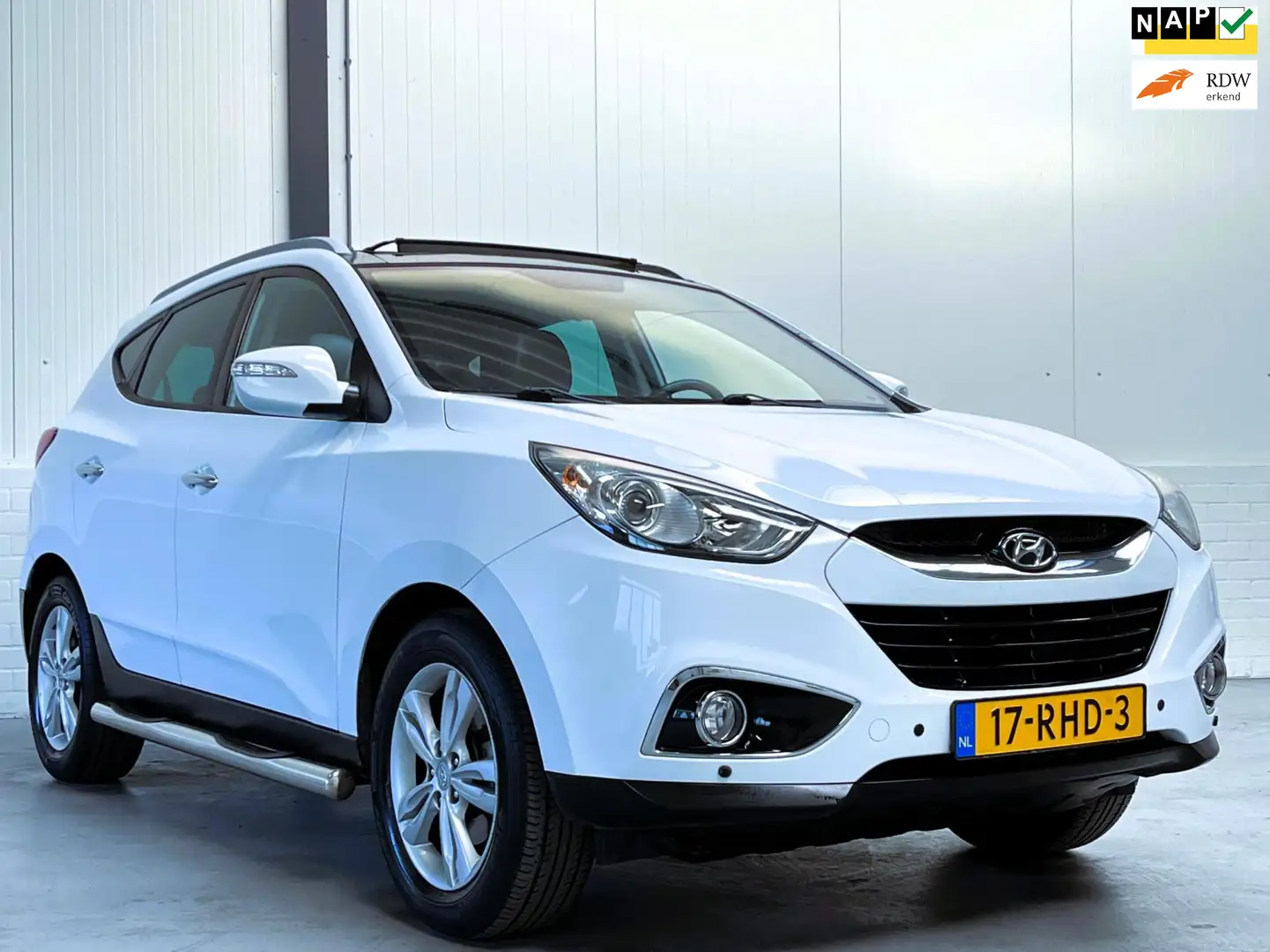 Hyundai iX35 2.0i Business Edition Pano|Trekhaak|Dealer O.H. Wit - 1