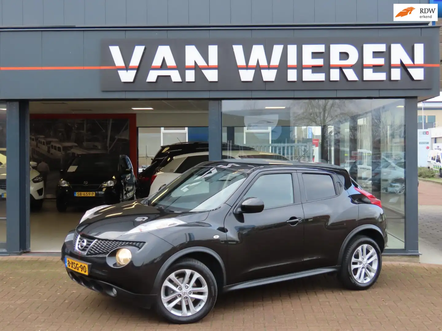 Nissan Juke 1.6 Acenta Clima Cruise 17" Lage KM Zwart - 1