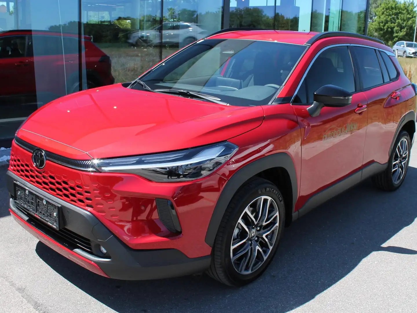 Toyota Corolla Cross 1,8 VVT-i Hybrid Aut. Teamplayer Rot - 1