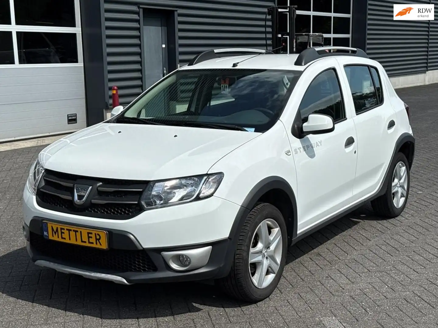 Dacia Sandero 0.9 TCe Stepway Lauréate, Navi, Clima, PDC Wit - 1