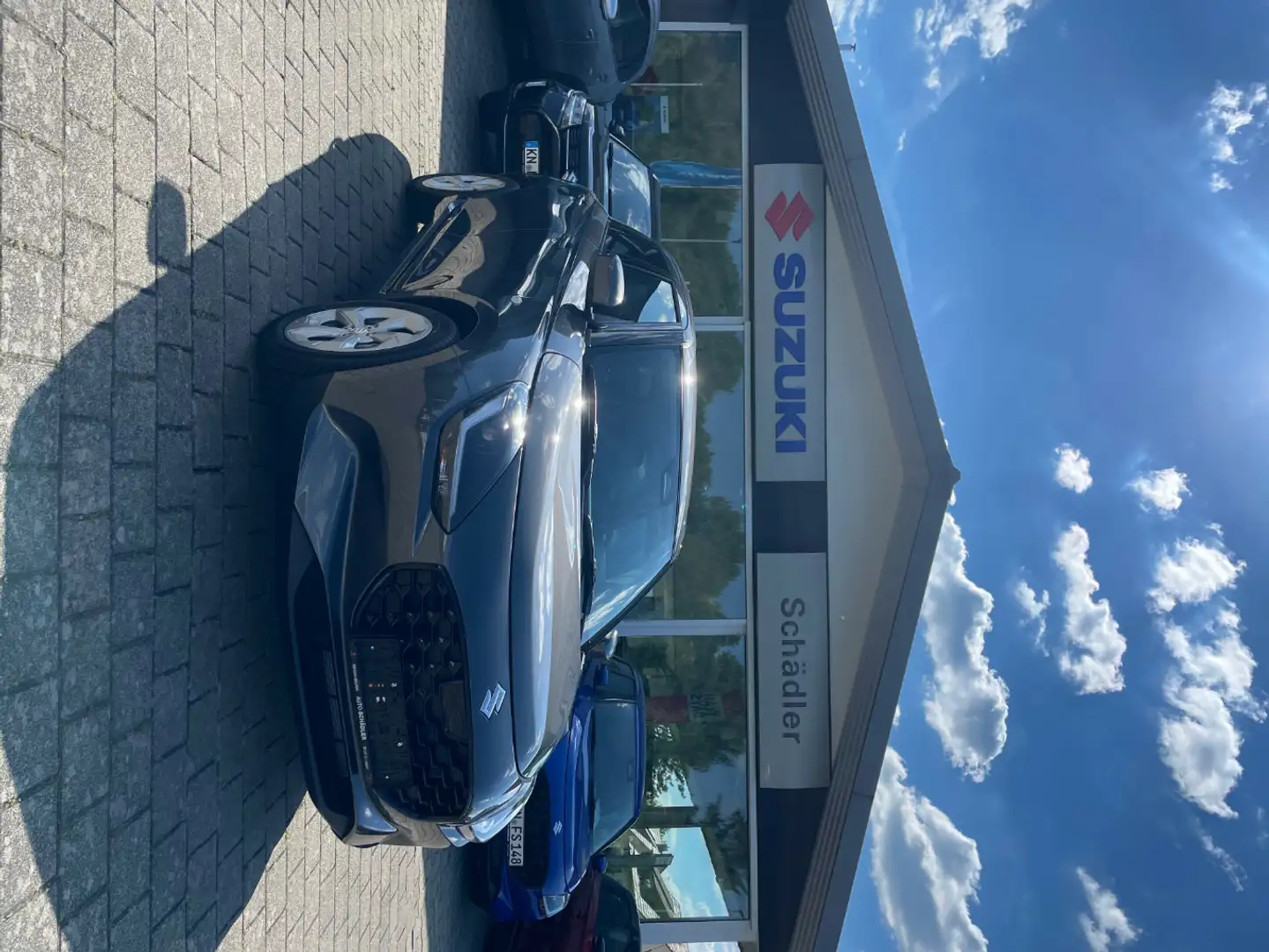 Suzuki Swift 1.2 Dualjet Hybrid 61 kW Comfort Grijs - 1