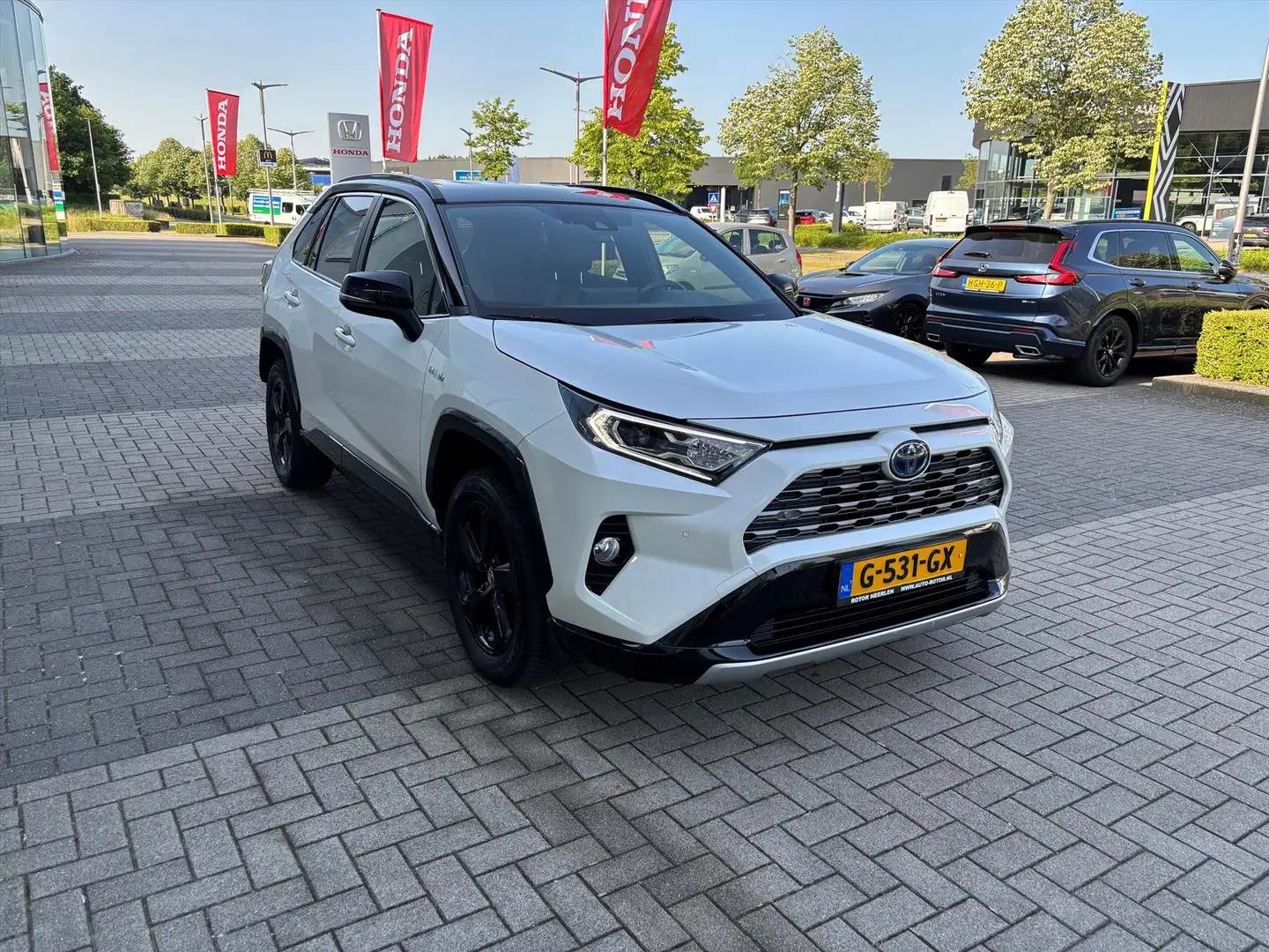 Toyota RAV 4 2.5 Hybrid 218pk Bi-Tone | Pdc | P.Cam | Navi | El Wit - 2