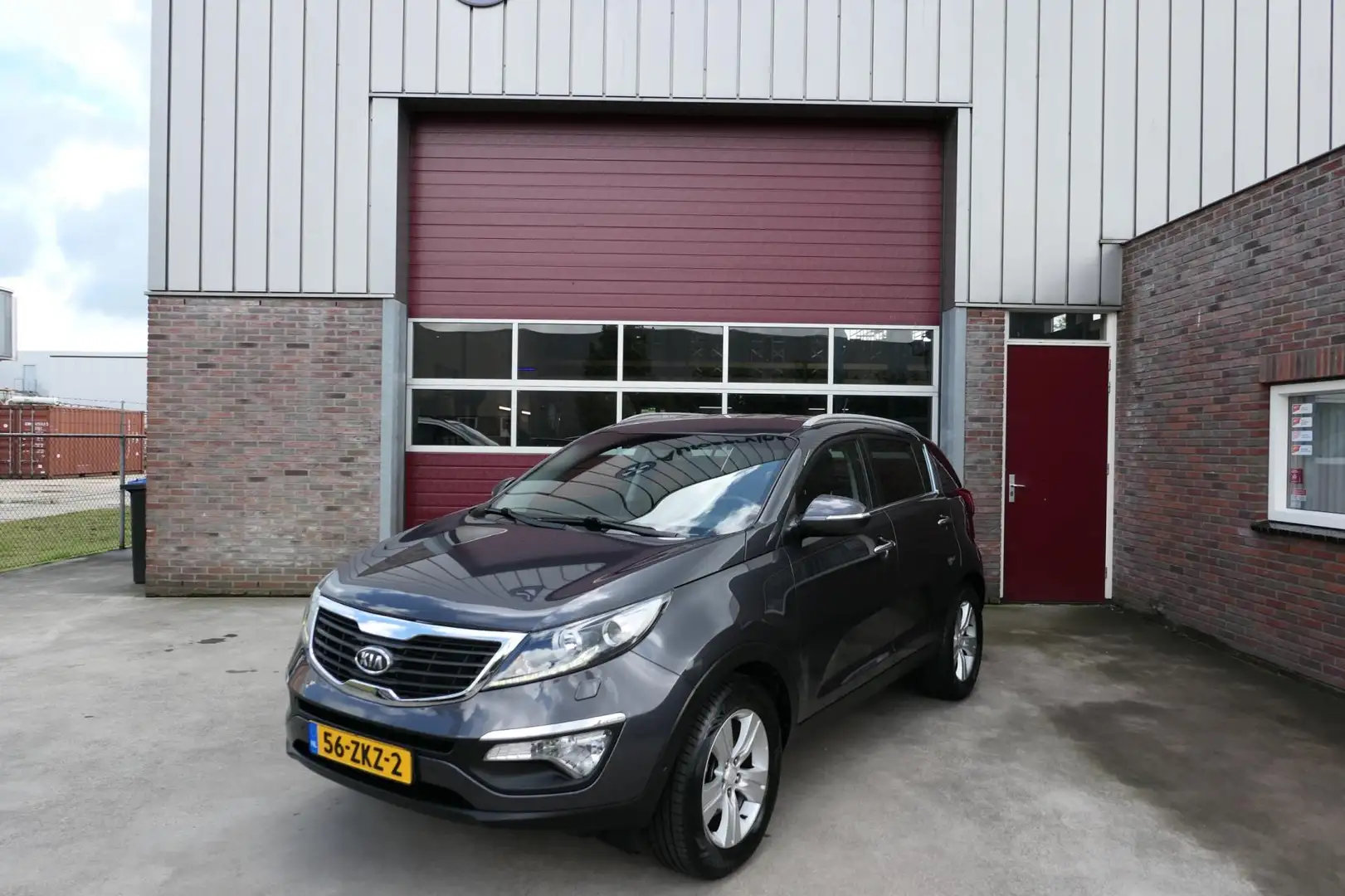 Kia Sportage 2.0 Super Pack, Trekhaak, Zeer netjes, Camera, Nav Grijs - 1
