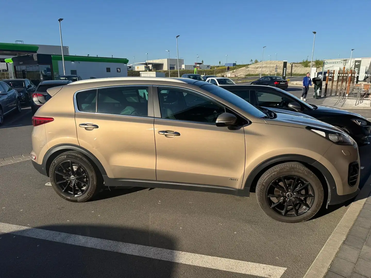 Kia Sportage 2,0 CRDI AWD Aut. Platinum Oro - 1