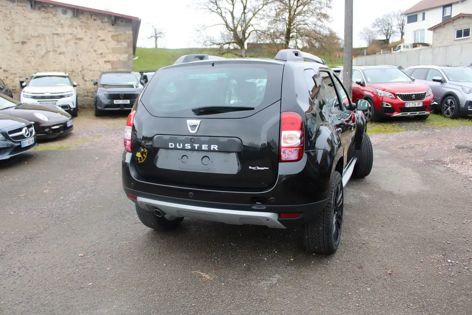 Dacia Duster BLACKSTORM 1L2 TCE 125 CV BOITE 6V GPS BLUETOOTH USB CLIMAT ABS ACCOUDOIR ALTI Noir - 2
