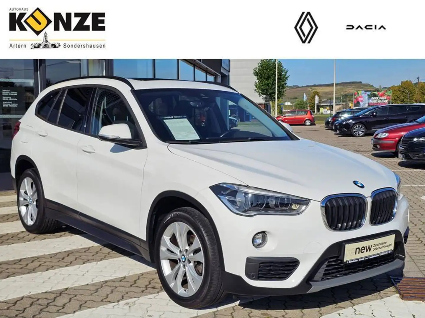 BMW X1 18i sDrive Automatik *SHZ/Pano/LED* Weiß - 1