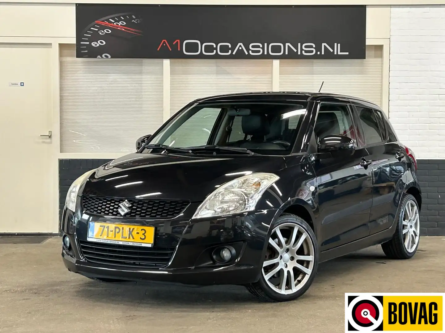 Suzuki Swift 1.2 Exclusive EASSS + STOELVERWARMING Zwart - 1
