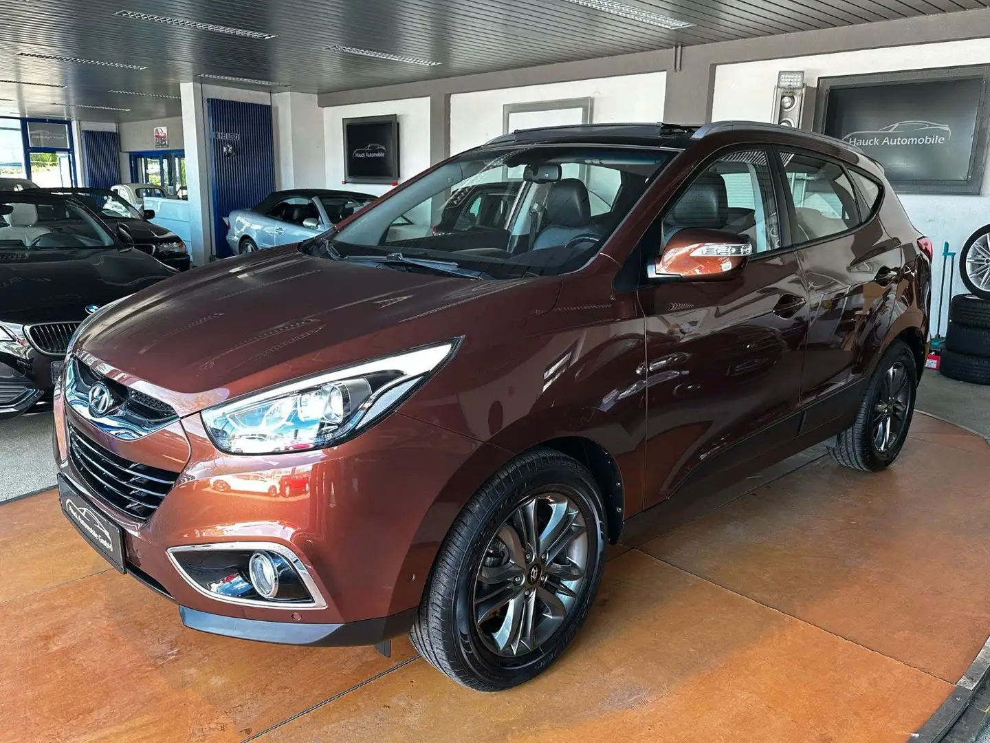 Hyundai TUCSON 1.HD/79-TKM/AUT./PANO/4xSHZ/MEDIA Braun - 1