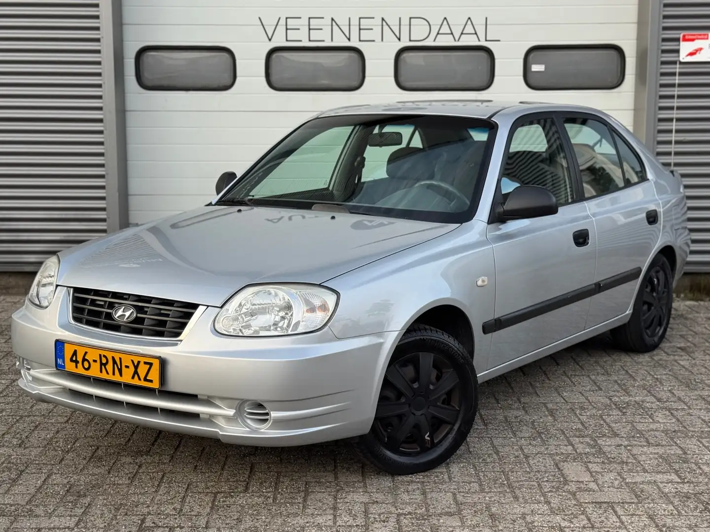 Hyundai ACCENT 1.3i Active APK 03-2026 AIRCO/TREKHAAK/EL. RAMEN Gris - 2