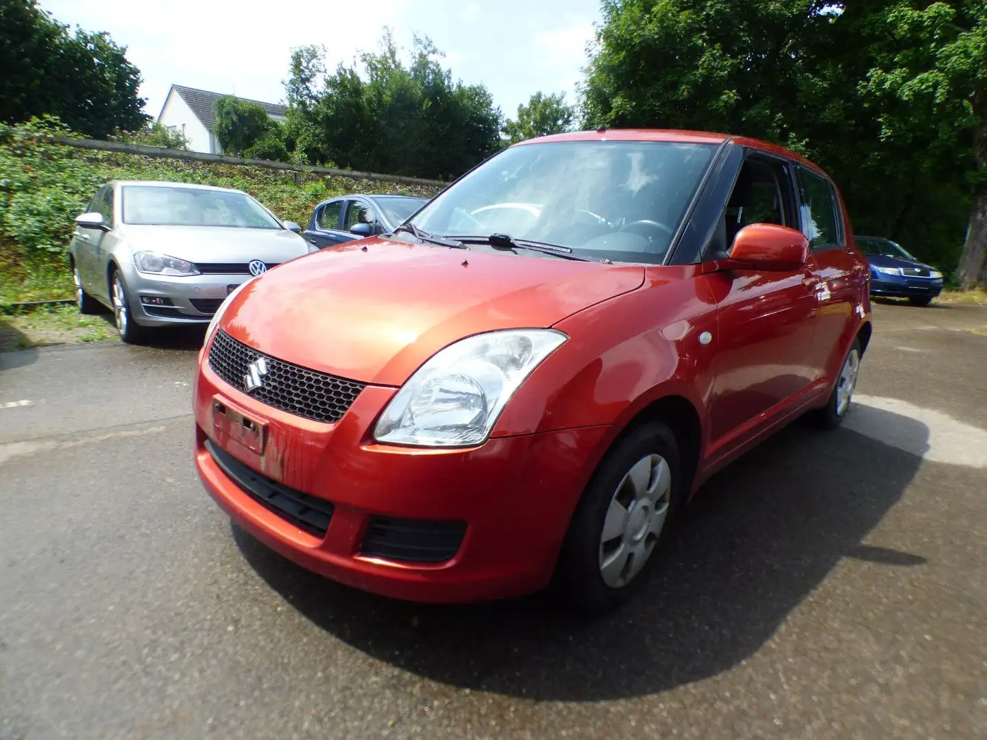 Suzuki Swift Lim. Black and White *KLIMA* Orange - 1