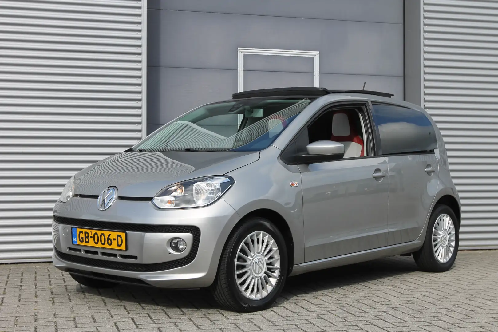 Volkswagen up! 1.0 high up! BlueMotion I Airco I Pano.Dak I Cruis Grijs - 1
