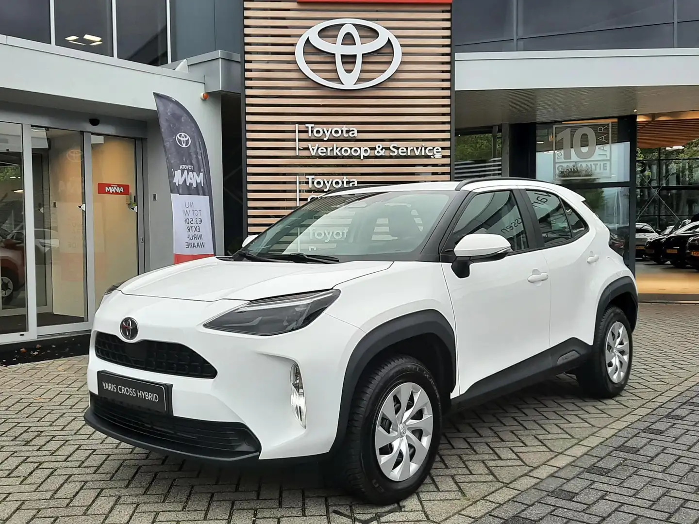 Toyota Yaris Cross 1.5 Hybrid 115 Business ALL-SEASON STOELVERW APPLE - 1