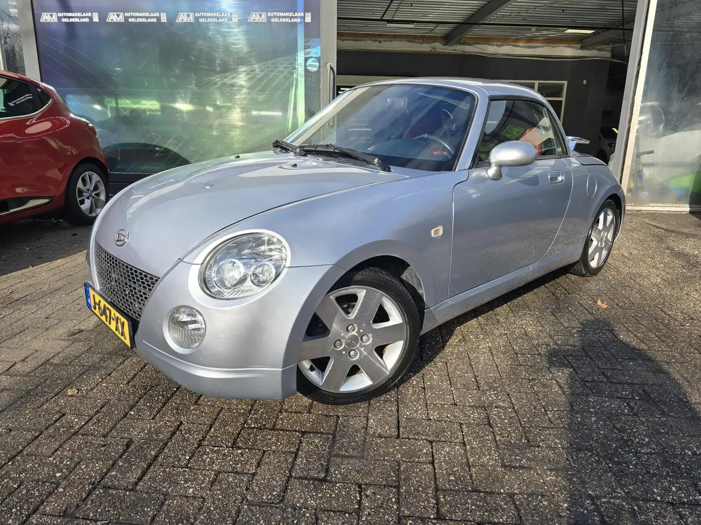 Daihatsu Copen 1.3-16V | 12MND GARANTIE | NIEUWE APK | LEDER | AI Gris - 1