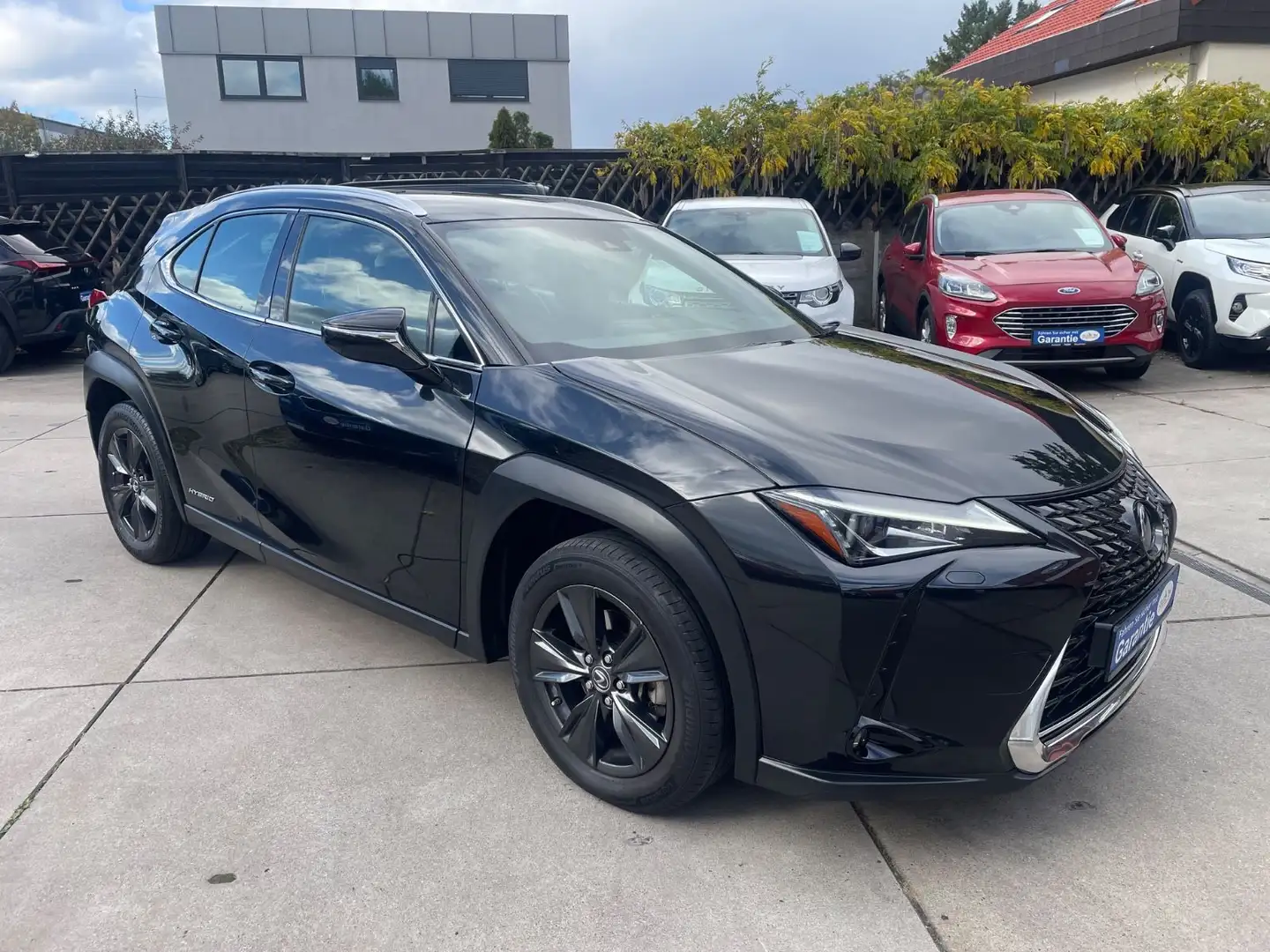 Lexus UX 250h 2,0 Hybrid Automatik/Leder/Klima/Navi/Kam Schwarz - 1