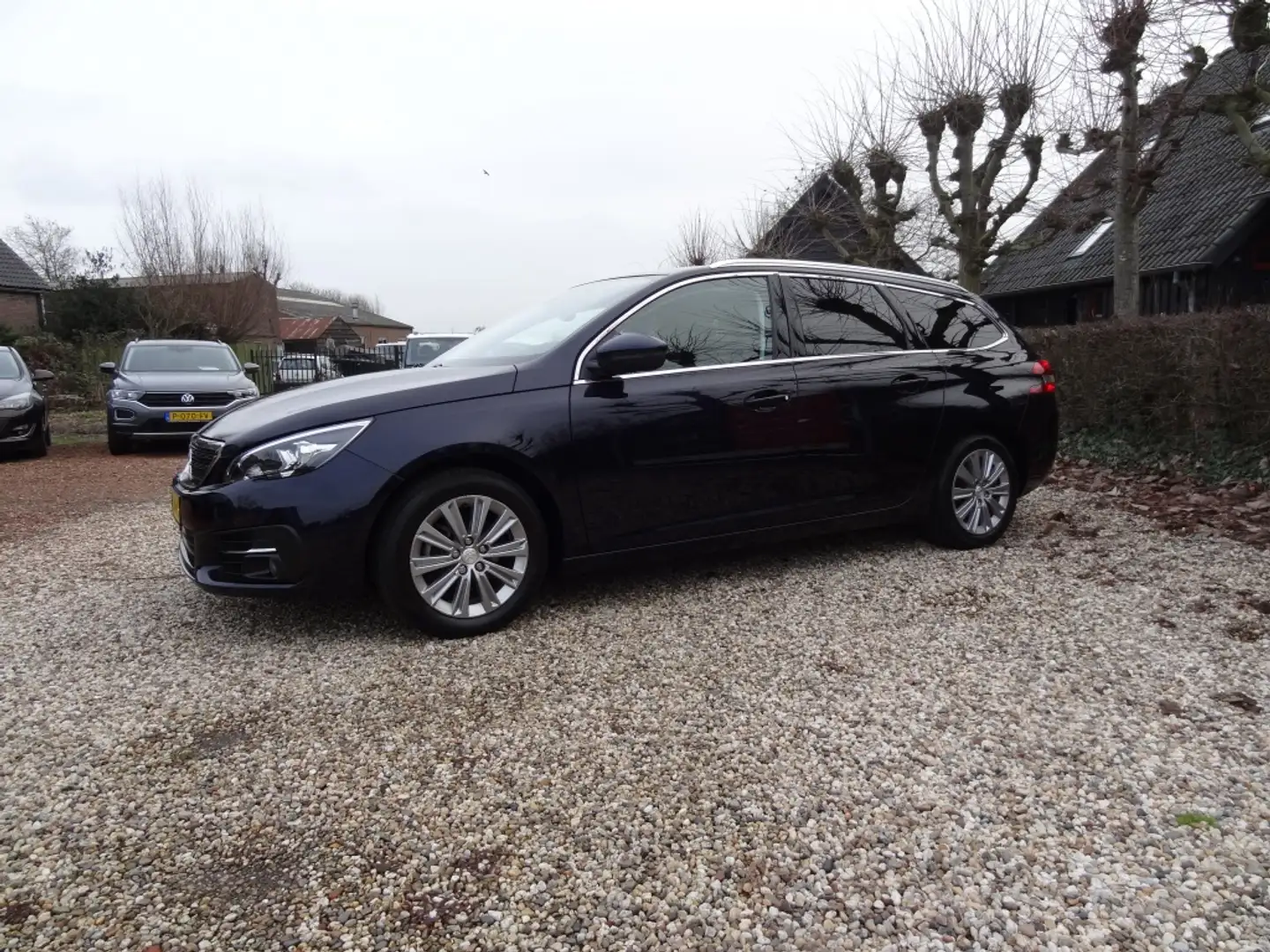 Peugeot 308 SW 130PK Aut. Lease Premium Navi/Pano/Camera Blauw - 1