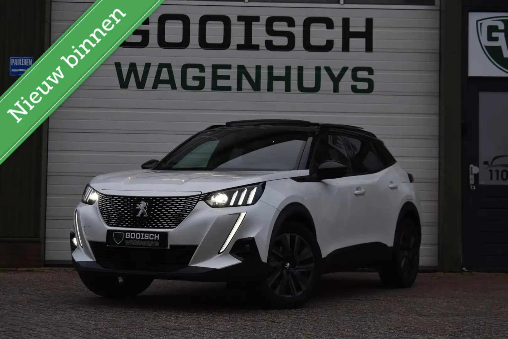 Peugeot e-2008 EV GT Pack 50 kWh | Panorama | Camera | Stoelverwa Blanc - 1