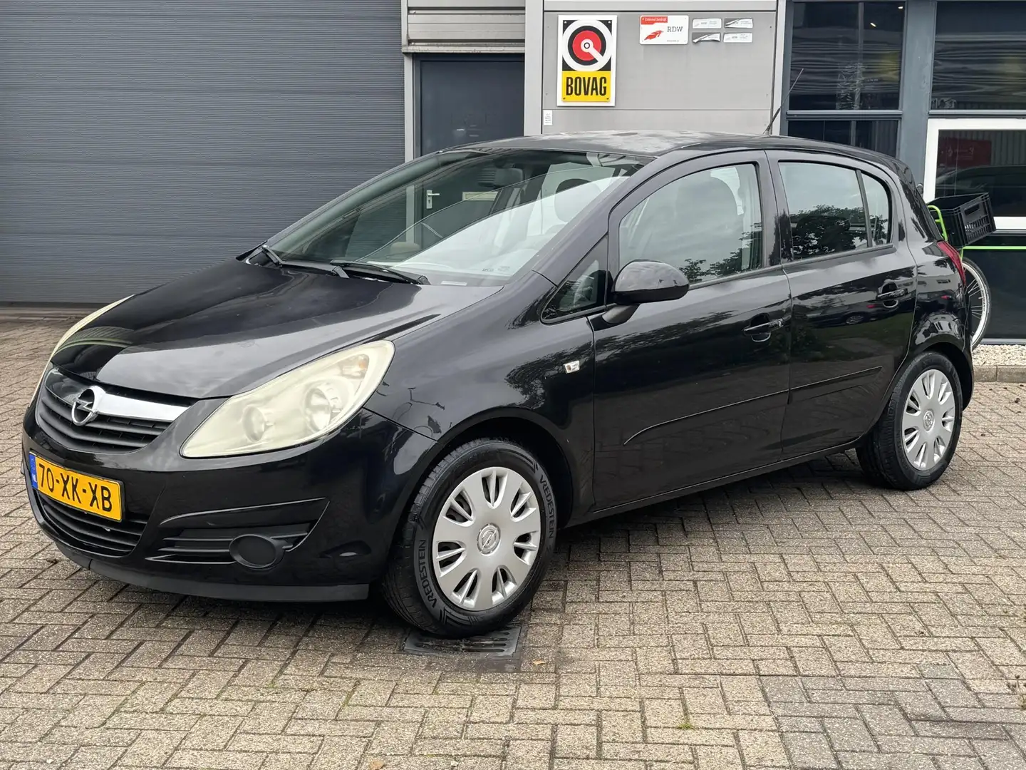 Opel Corsa 1.2-16V Business | Airco | 1e Eigenaar | Nieuwe AP Zwart - 1