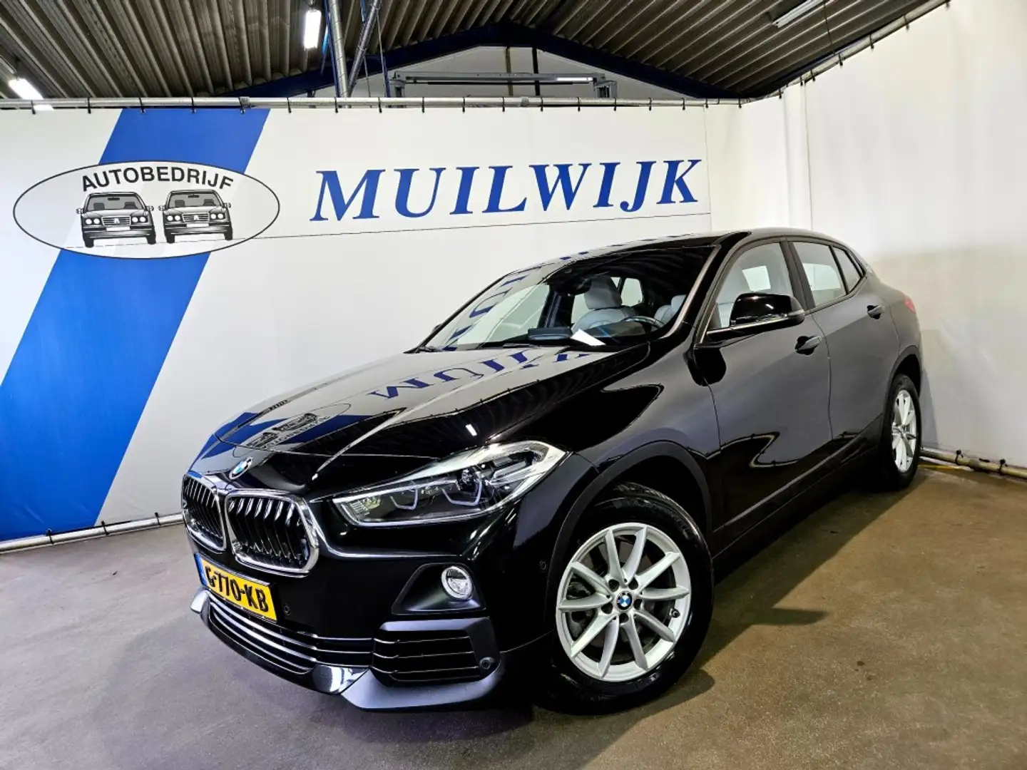 BMW X2 sDrive20i High Executive Edition / Sportstoelen / Noir - 1