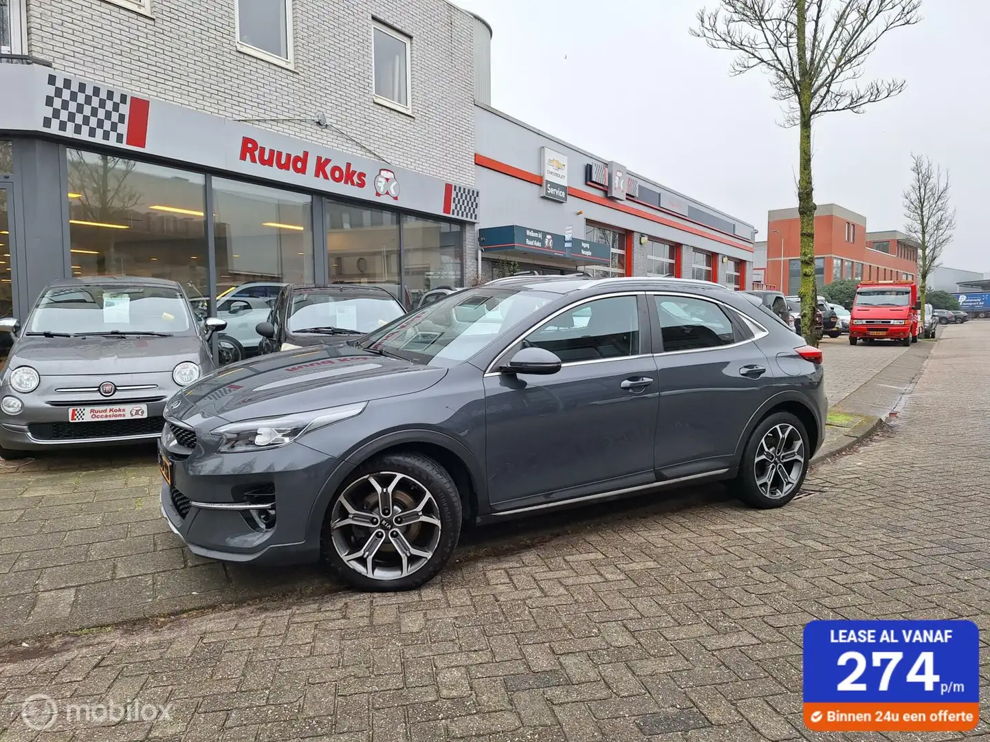 Kia XCeed 1.0 T-GDi DYNAMICLINE / 1e Eigenaar / Camera / Grijs - 1