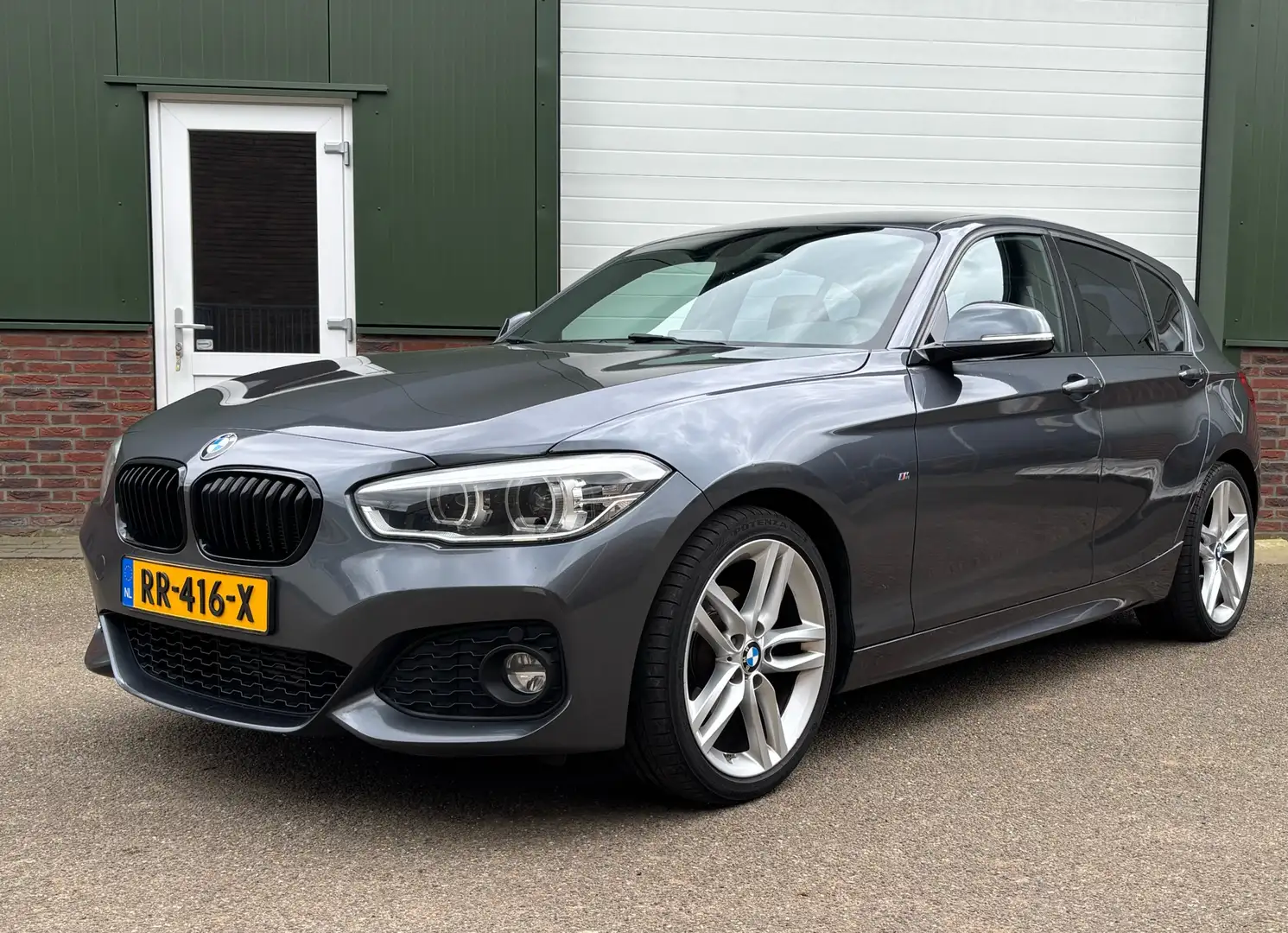 BMW 118 M-Pakket 2017 Automaat High Exec Grijs - 1